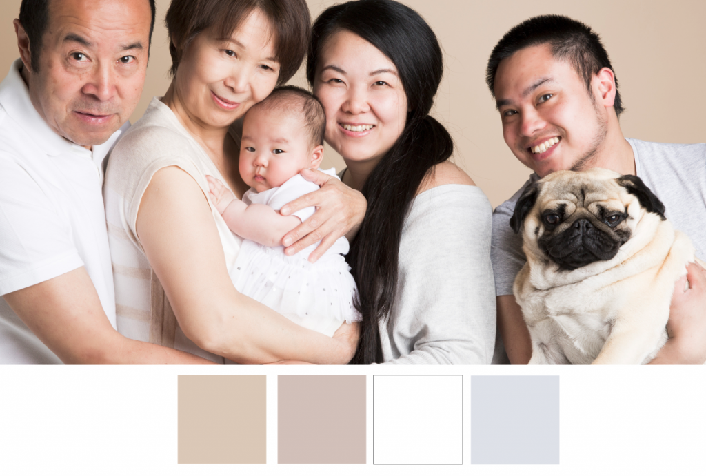 Asian Family, neutral colour tones for family photo. Photographed by Enhance Photography Studios