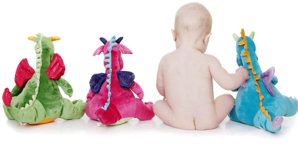 Cute baby butt photo with dragon toys