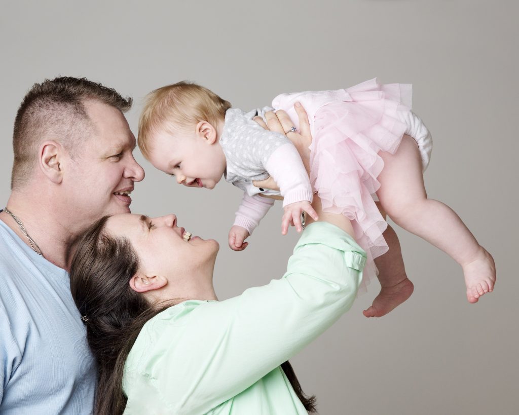 Happy newborn baby smiling photography melbourne